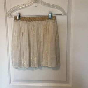 Chic Cream Mini Skirt with Gold Accents Waist S